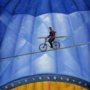 Illustration of business person on a circus high wire