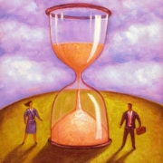Illustration of businesspeople next to a giant hourglass